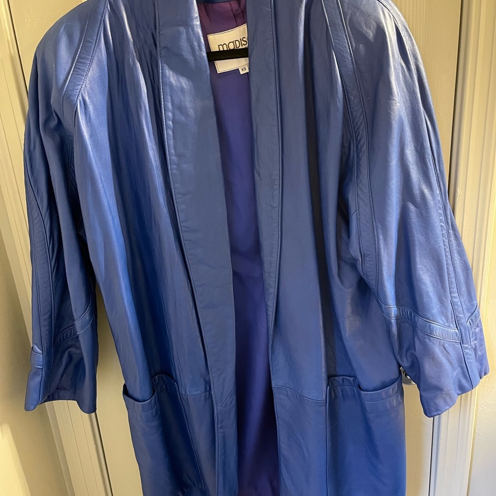 Leather coat. Vintage. Madison’s the coat store.  XS. Made in USA.  Blue